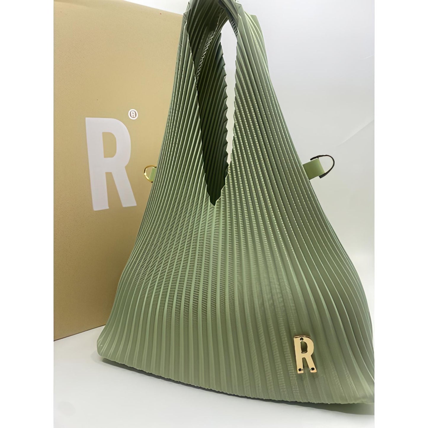 حقيبة صغيرة فستقية (ريبليت)