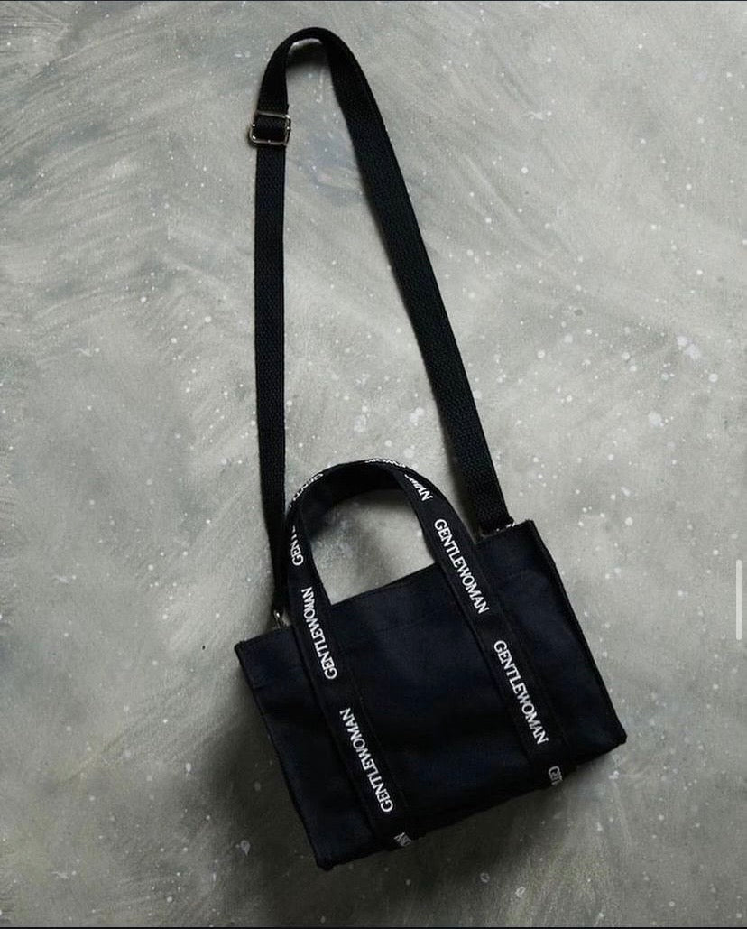 حقيبة سوداء متوسطة الحجم (امرأة لطيفة)